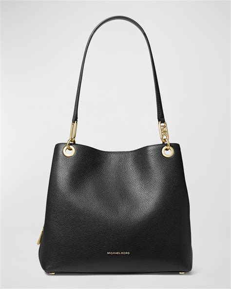 is michael kors better than guess|michael kors leather bags.